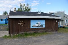 22 Painting Of Radium King Ship On Brown Building In Inuvik Northwest Territories.jpg